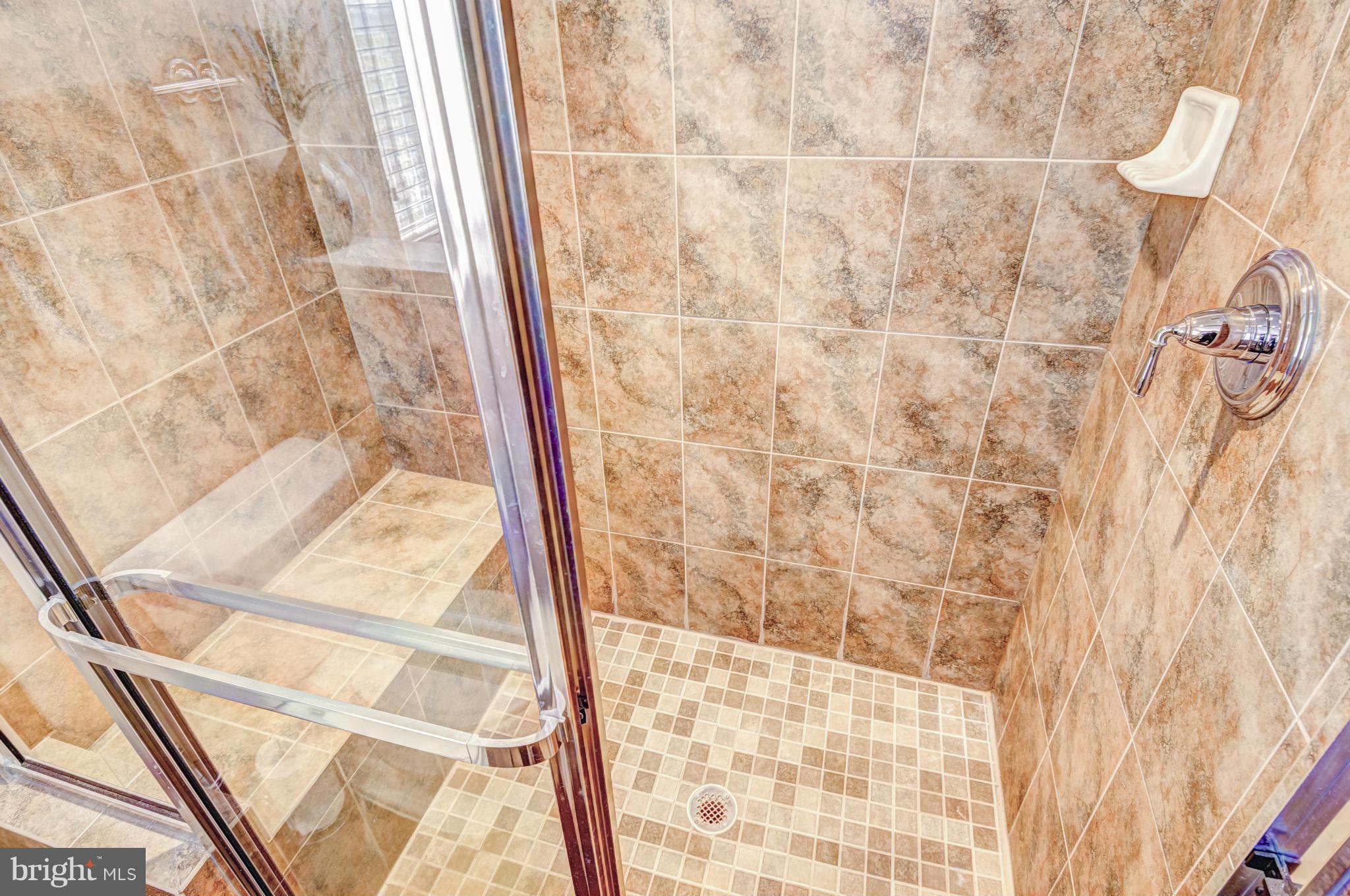 2106 Baythorne Road Prince Frederick, MD 20678 - Photo 18 of 30 a bathroom with a shower