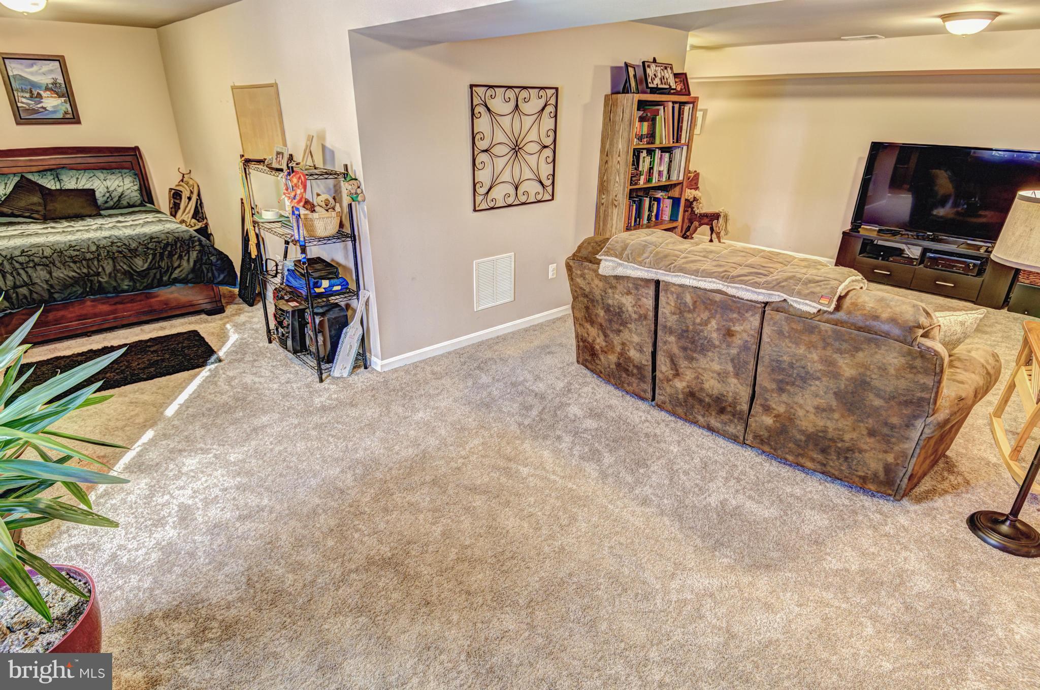 2106 Baythorne Road Prince Frederick, MD 20678 - Photo 25 of 30 a view of a bedroom with toys and dresser