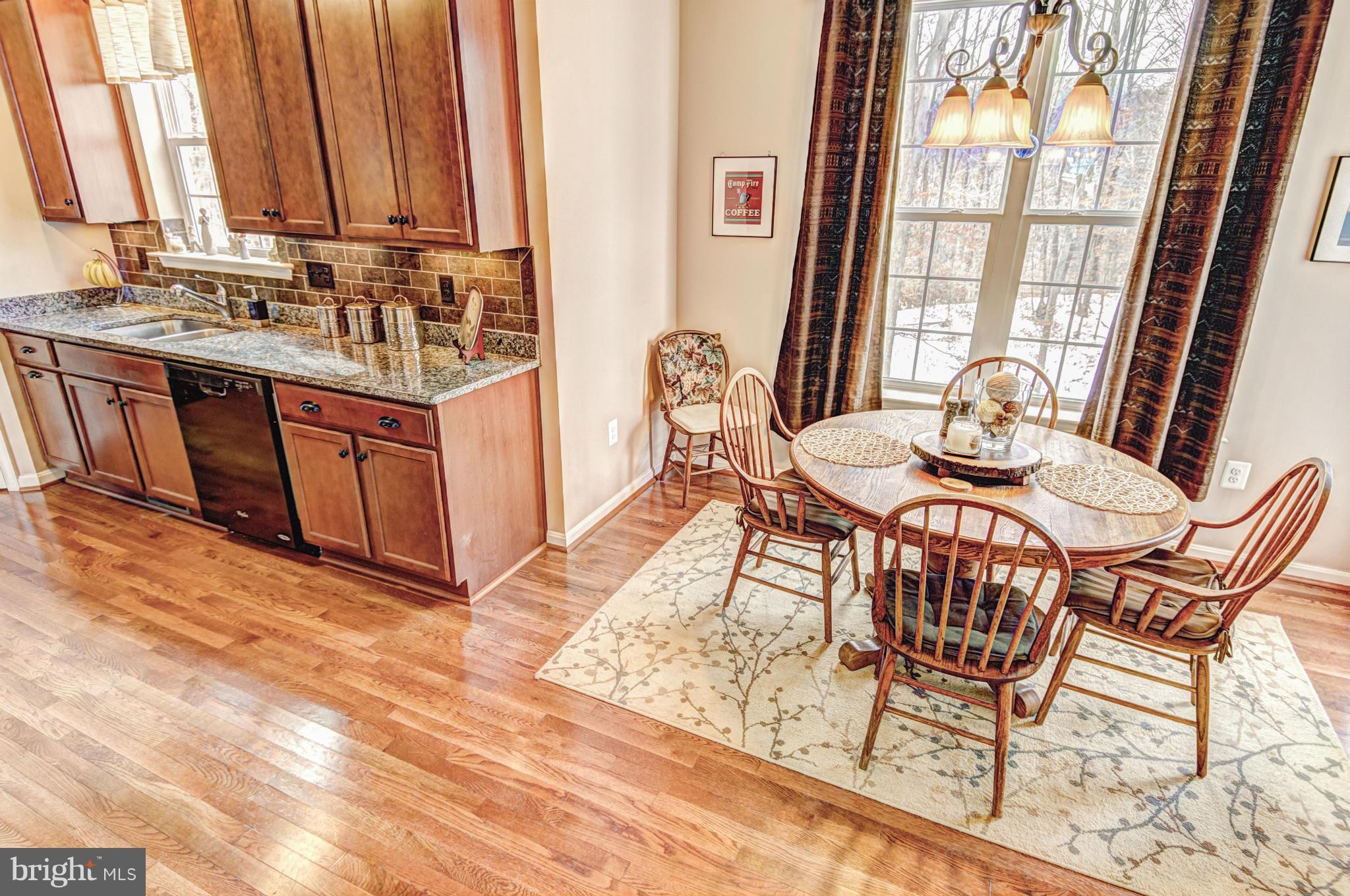 2106 Baythorne Road Prince Frederick, MD 20678 - Photo 9 of 30 a view of a dining room with furniture and window