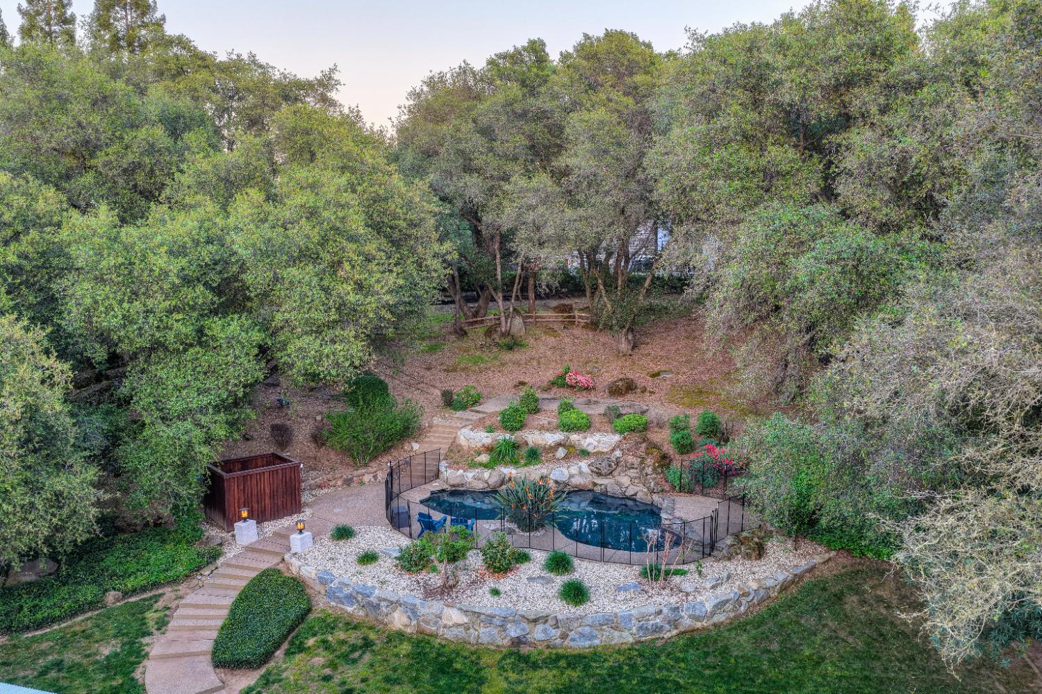 4911 Lexington Circle Loomis, CA 95650 - Photo 27 of 48 a view of a backyard with a fountain