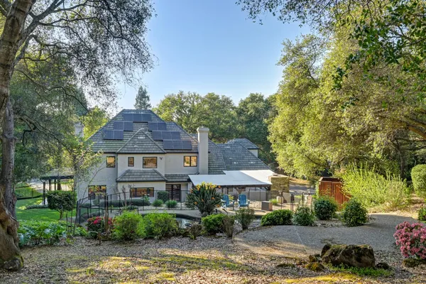 a backyard of a house with lots of green space