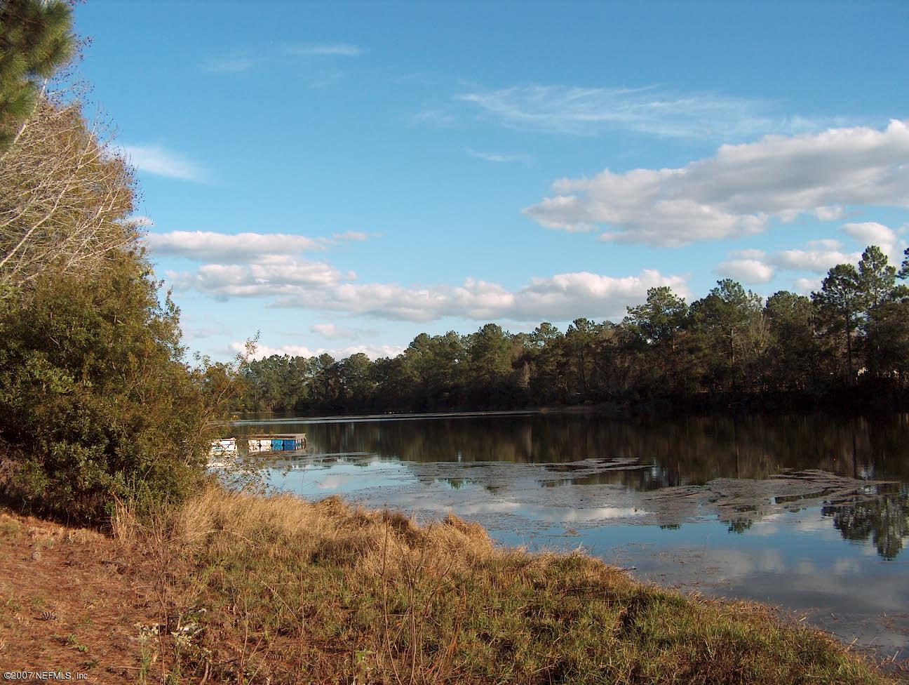 9444 Fish Road Jacksonville, FL 32220 - Photo 1 of 3 Huge stocked lake