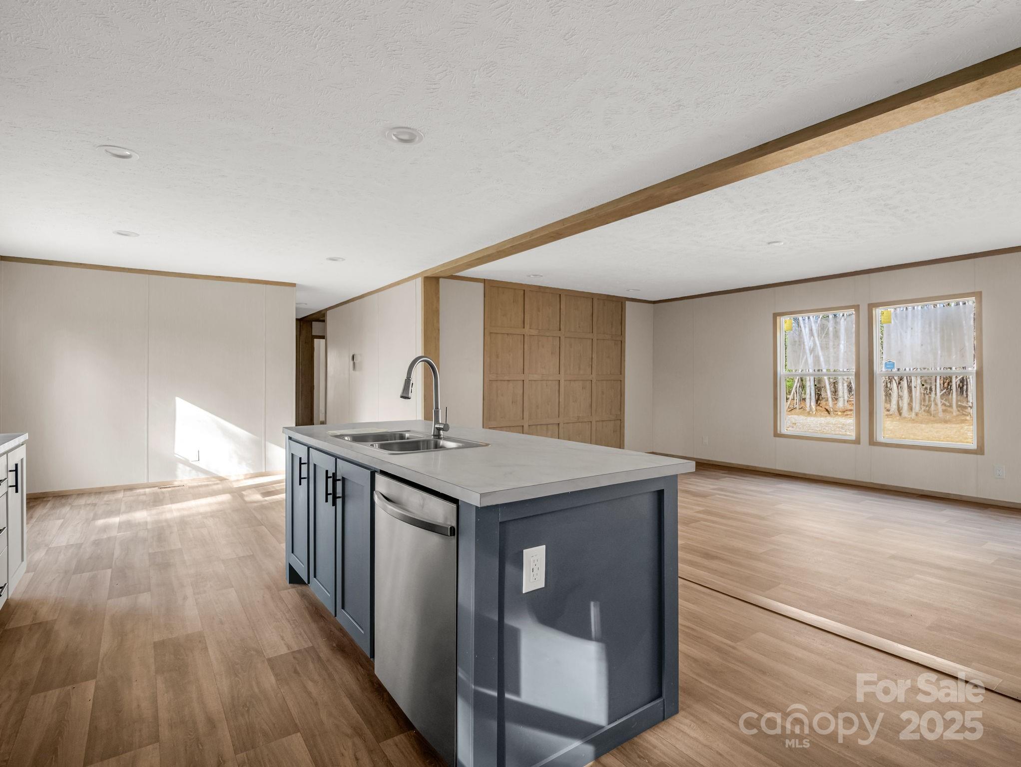 864 Tiney Road Ellenboro, NC 28040 - Photo 12 of 33 a kitchen with stainless steel appliances granite countertop a stove and a refrigerator
