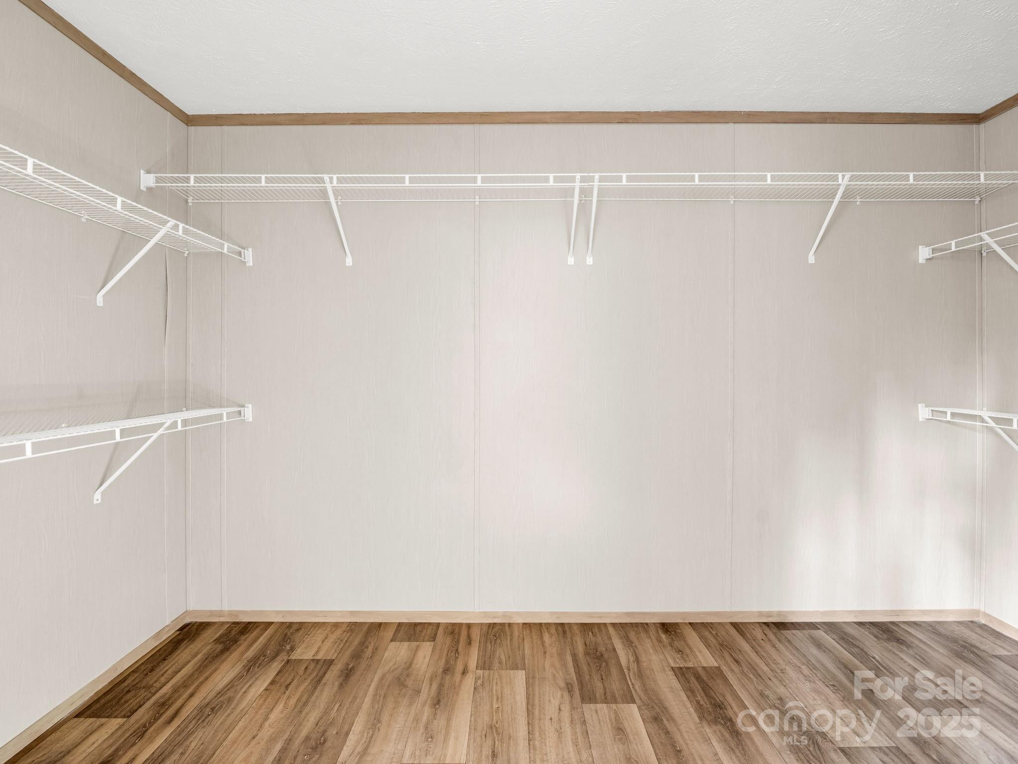 864 Tiney Road Ellenboro, NC 28040 - Photo 20 of 33 a view of a room with racks on the wall