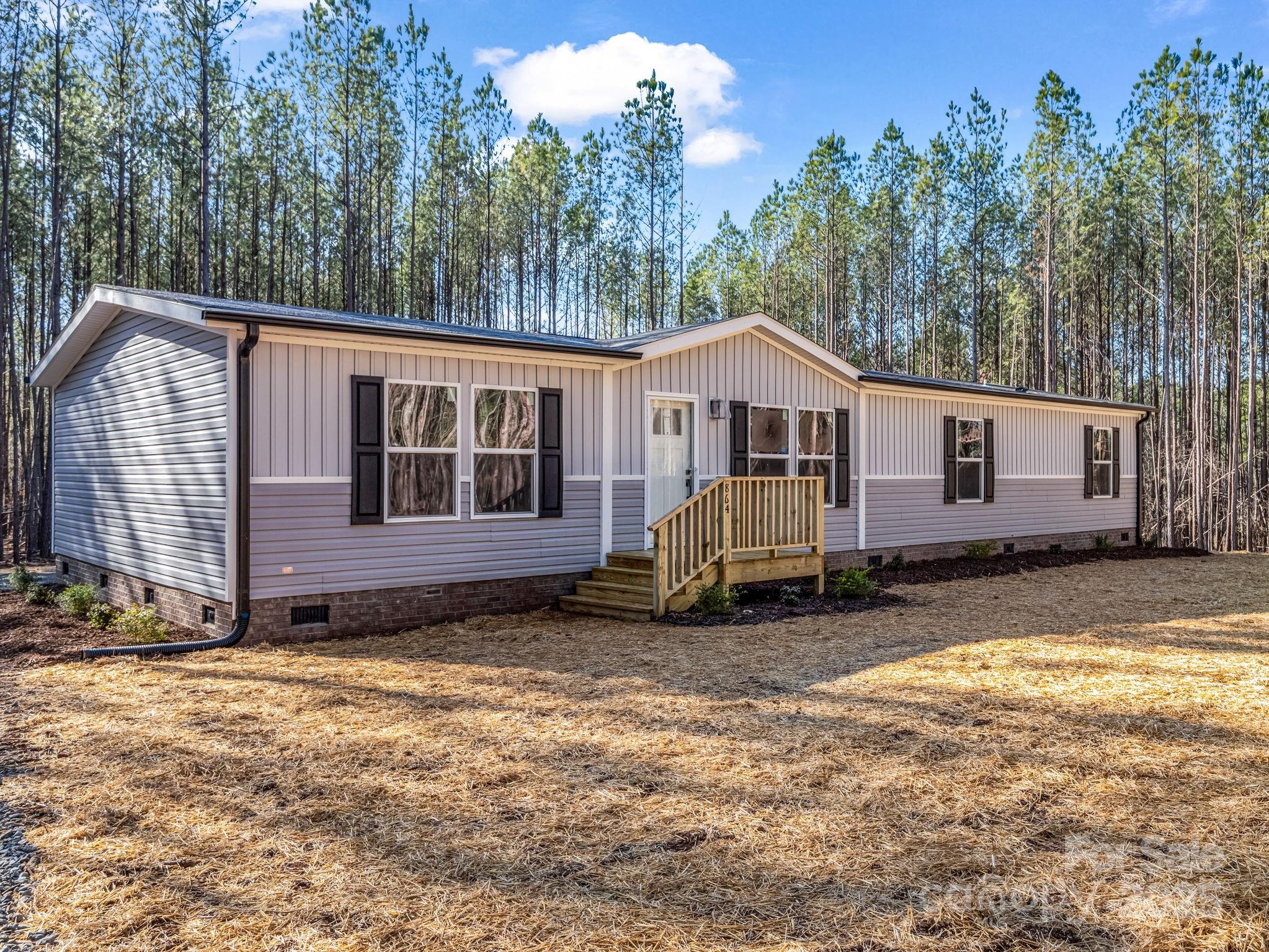 864 Tiney Road Ellenboro, NC 28040 - Photo 2 of 33 a view of a house with a yard