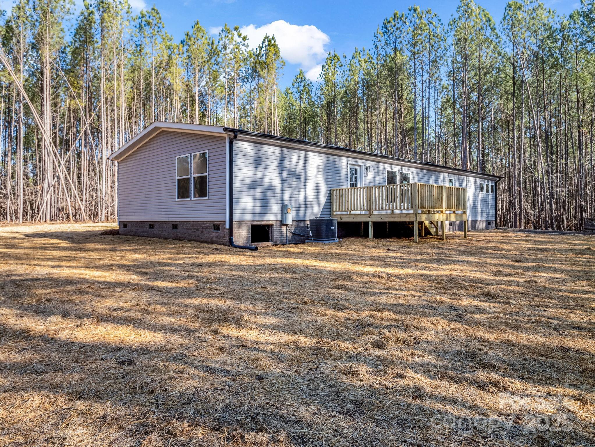 864 Tiney Road Ellenboro, NC 28040 - Photo 4 of 33 a view of a house with a yard