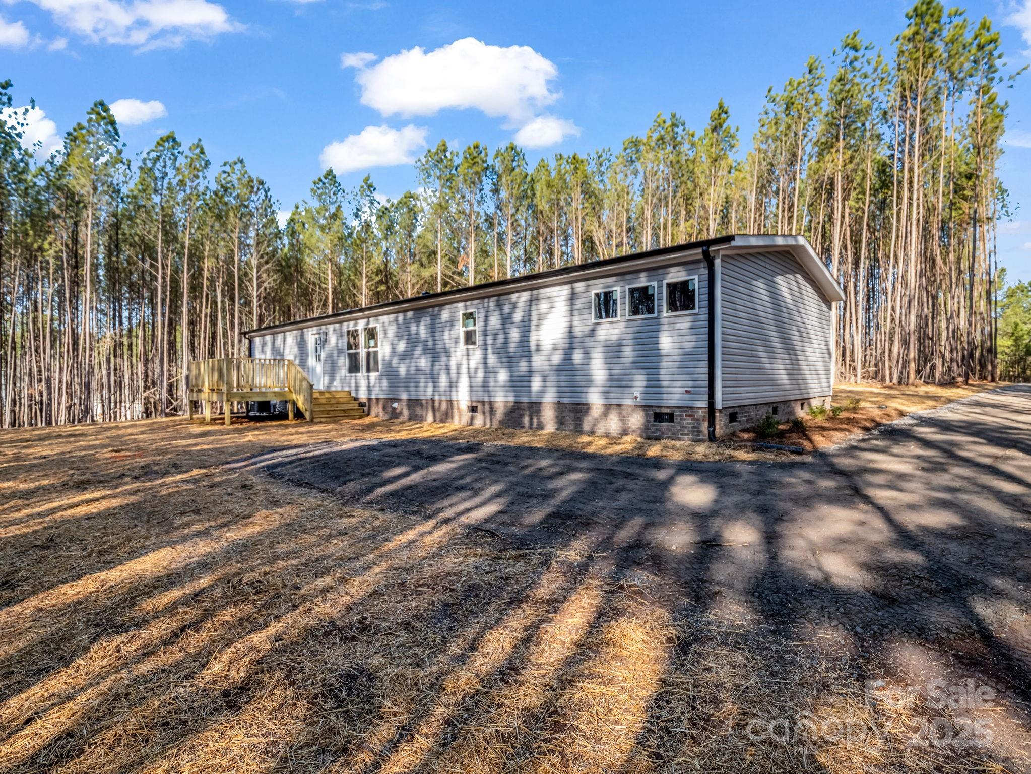 864 Tiney Road Ellenboro, NC 28040 - Photo 6 of 33 a view of a house with a yard