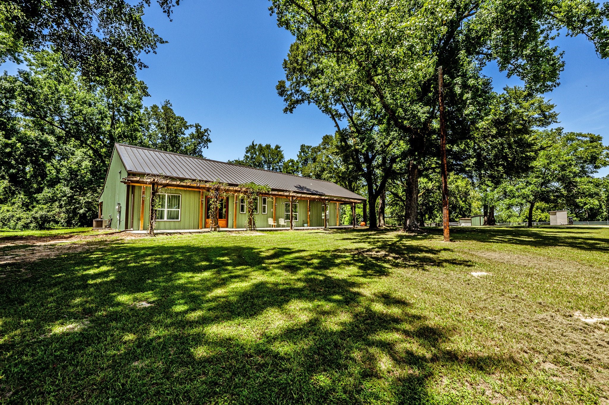 13334 Fultz Road Conroe, TX 77304 - Photo 49 of 49 a view of a house with a yard