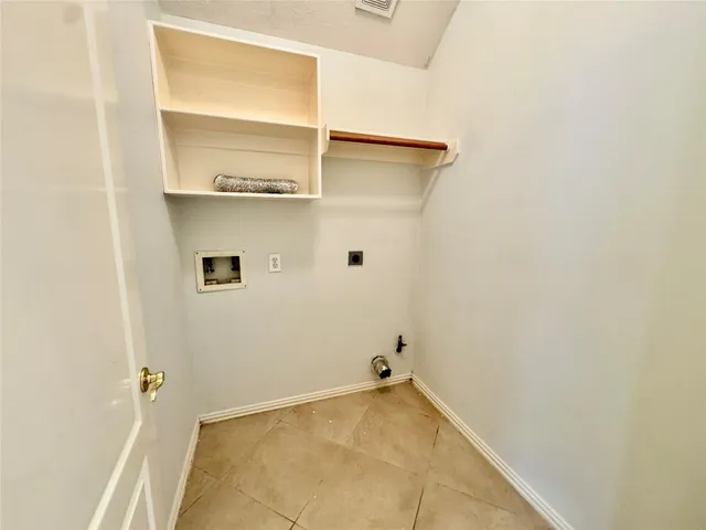 a view of a room with rack on the wall