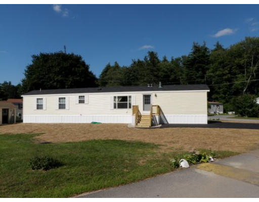 21 Hagop Road, Unit 21 Salem, NH 03079 - Photo 1 of 1 a view of a backyard