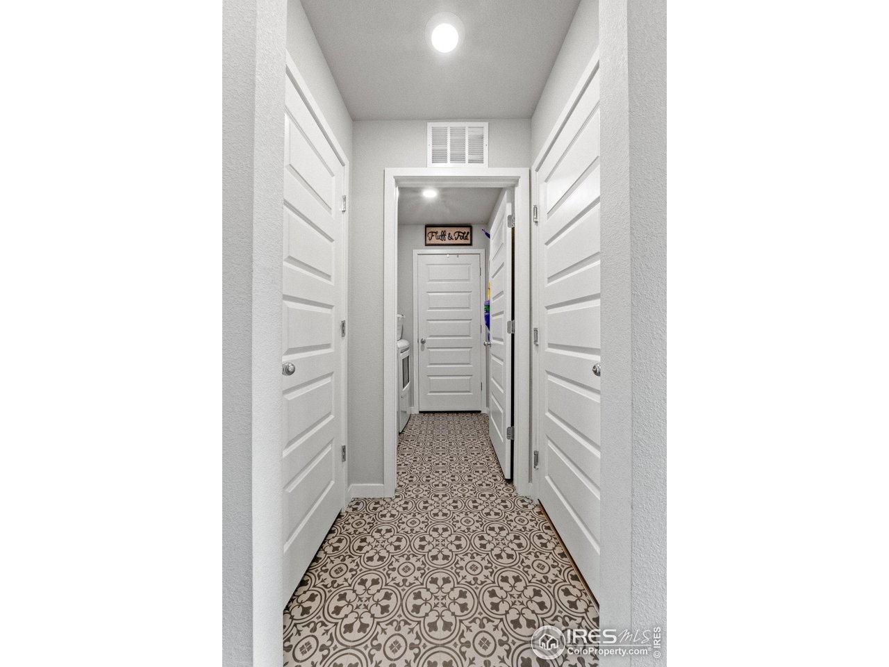 515 Wildcat Parkway Wiggins, CO 80654 - Photo 14 of 43 a view of a hallway