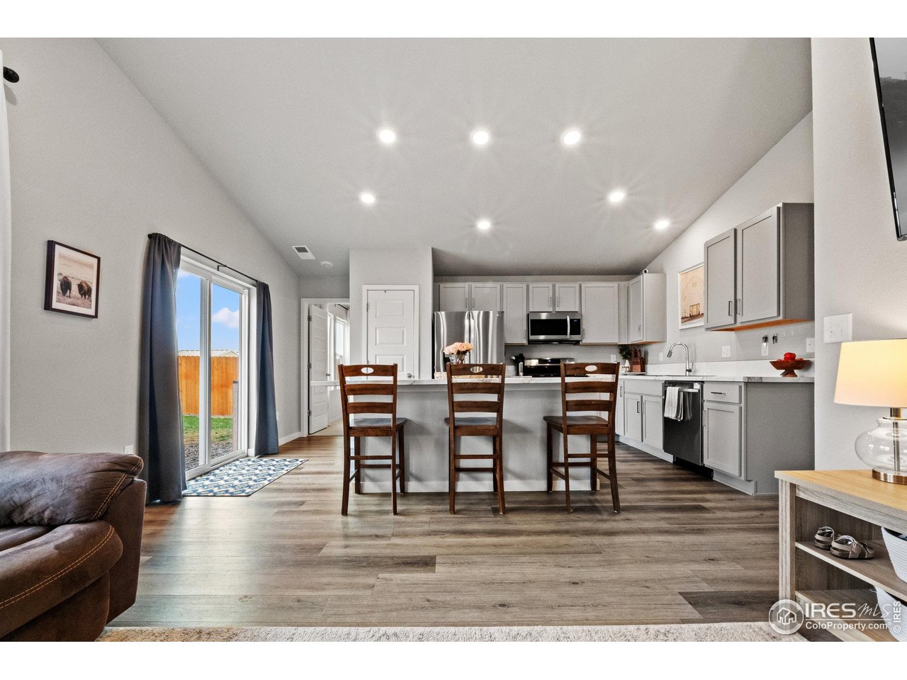 515 Wildcat Parkway Wiggins, CO 80654 - Photo 26 of 43 a view of kitchen dining table and chairs