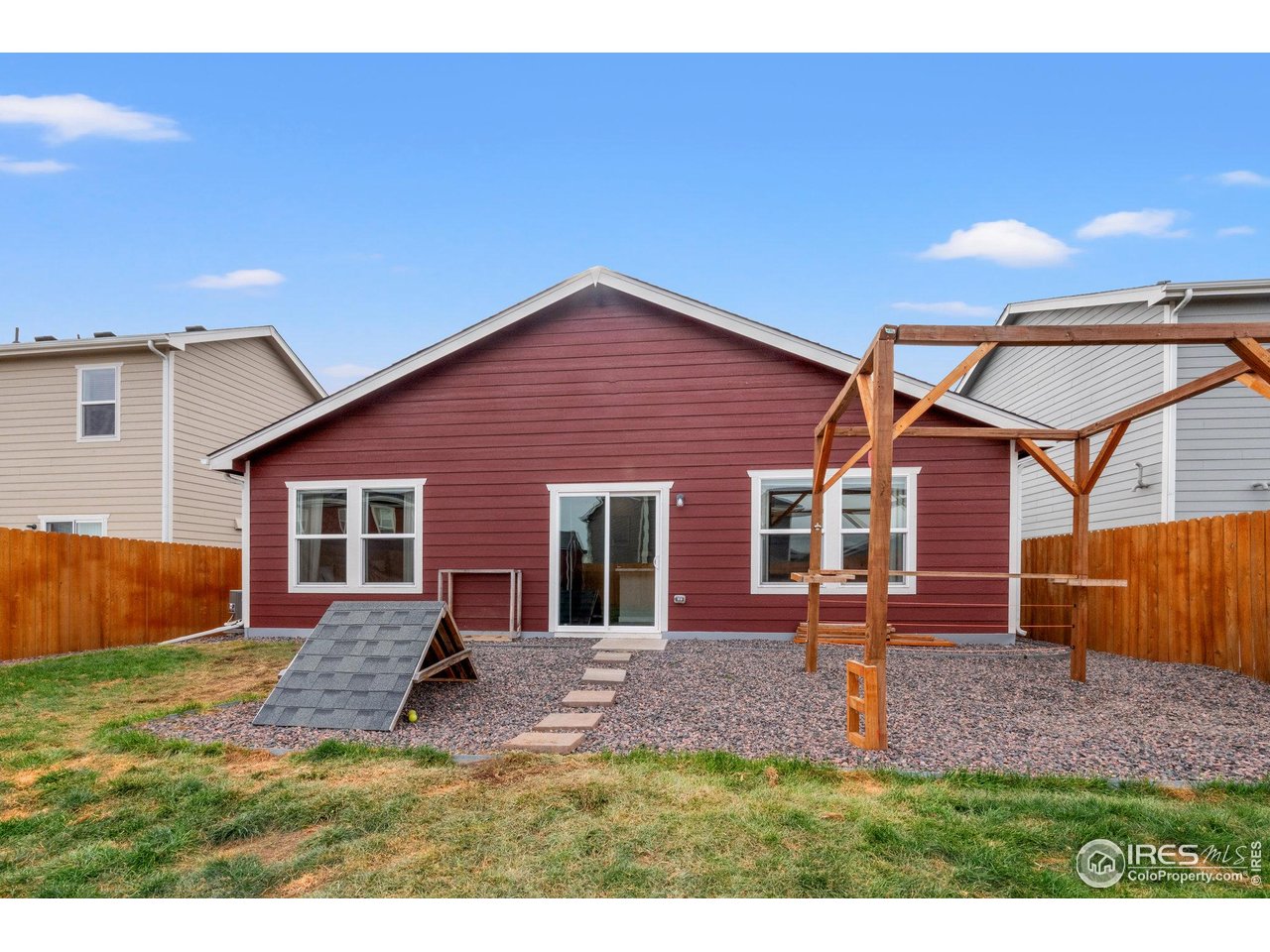 515 Wildcat Parkway Wiggins, CO 80654 - Photo 43 of 43 a view of a backyard of the house