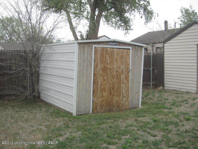4618 Cline Road Amarillo, TX 79110 - Photo 6 of 10 a view of a house with a yard
