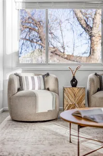 a living room with couch and a table