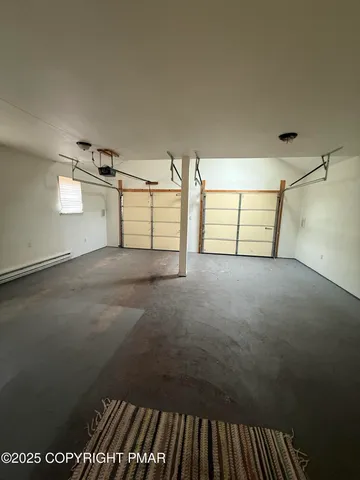 a view of empty room with windows