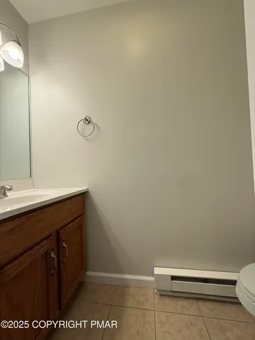 a bathroom with a sink and a toilet