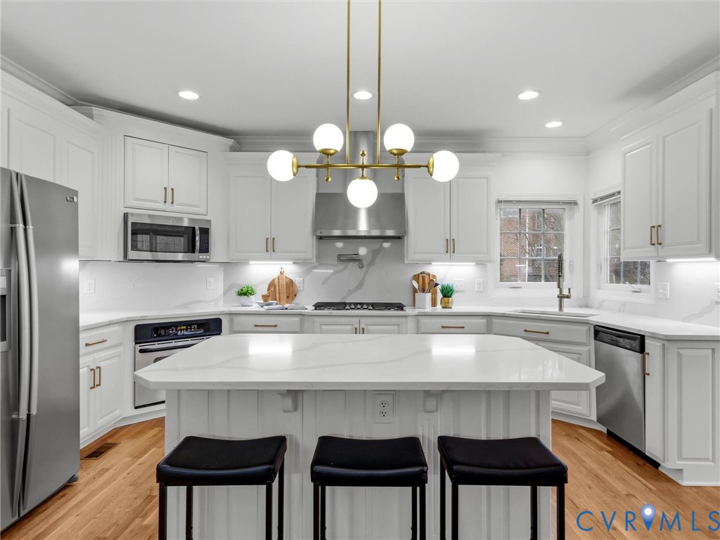 14335 Lander Road Midlothian, VA 23113 - Photo 16 of 70 a kitchen with stainless steel appliances a sink and stove