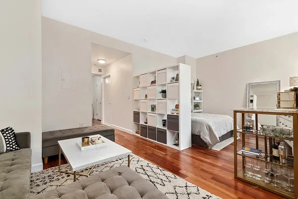 a living room with furniture and a table