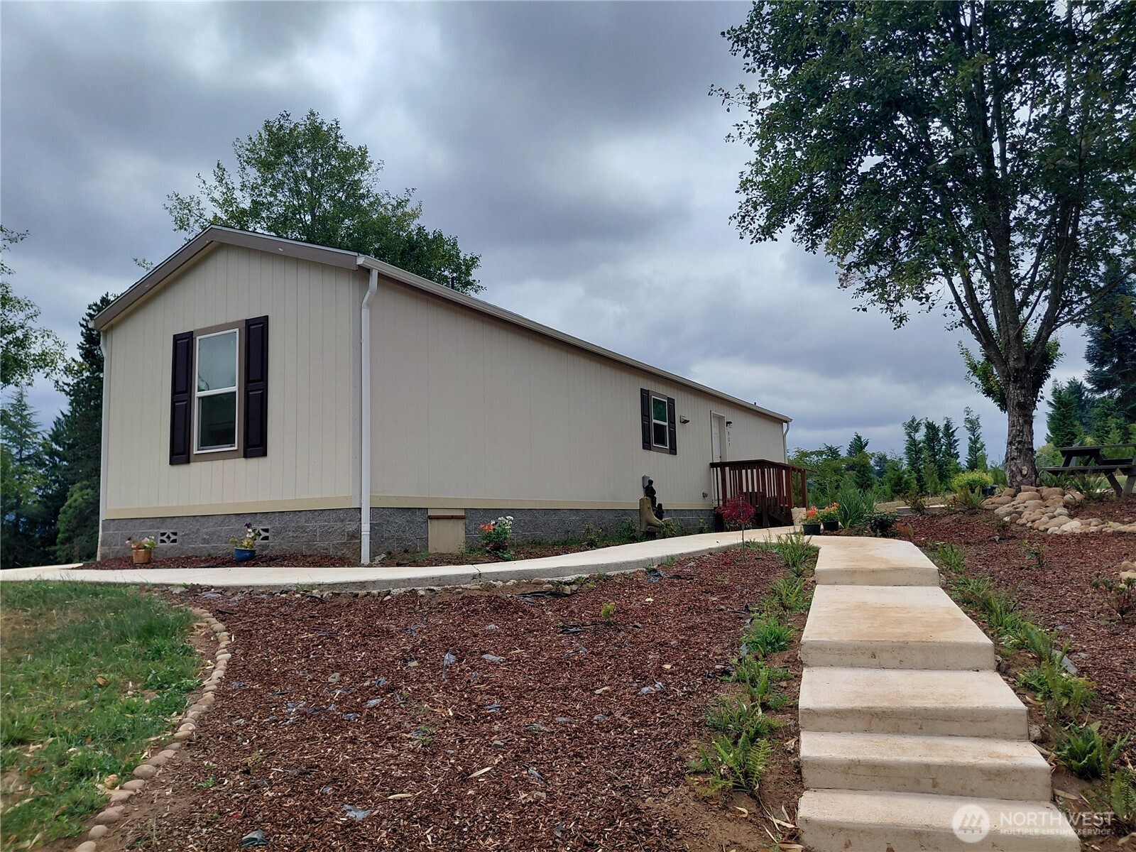 927 Cinebar Road Cinebar, WA 98533 - Photo 12 of 31 a front view of a house with a yard and trees
