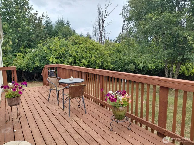 a view of a chairs on the roof deck