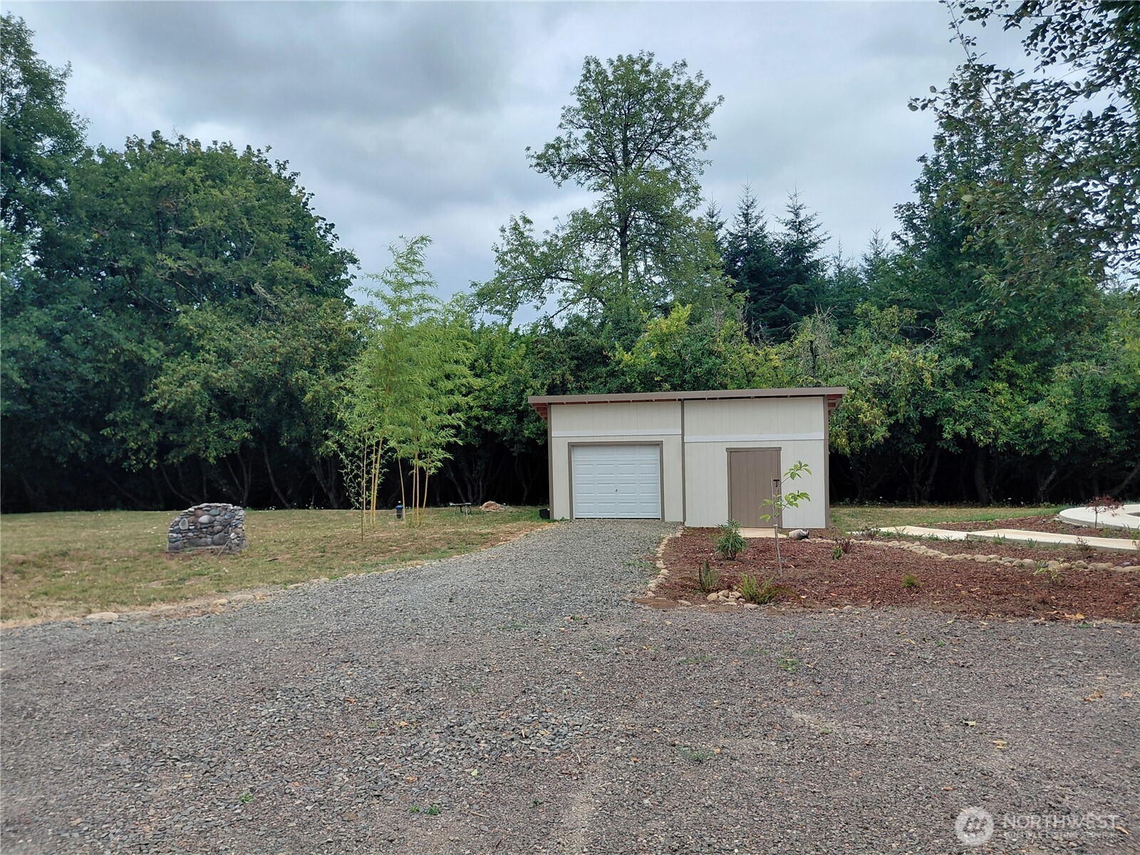 927 Cinebar Road Cinebar, WA 98533 - Photo 26 of 31 a view of backyard of house with outdoor space and trees