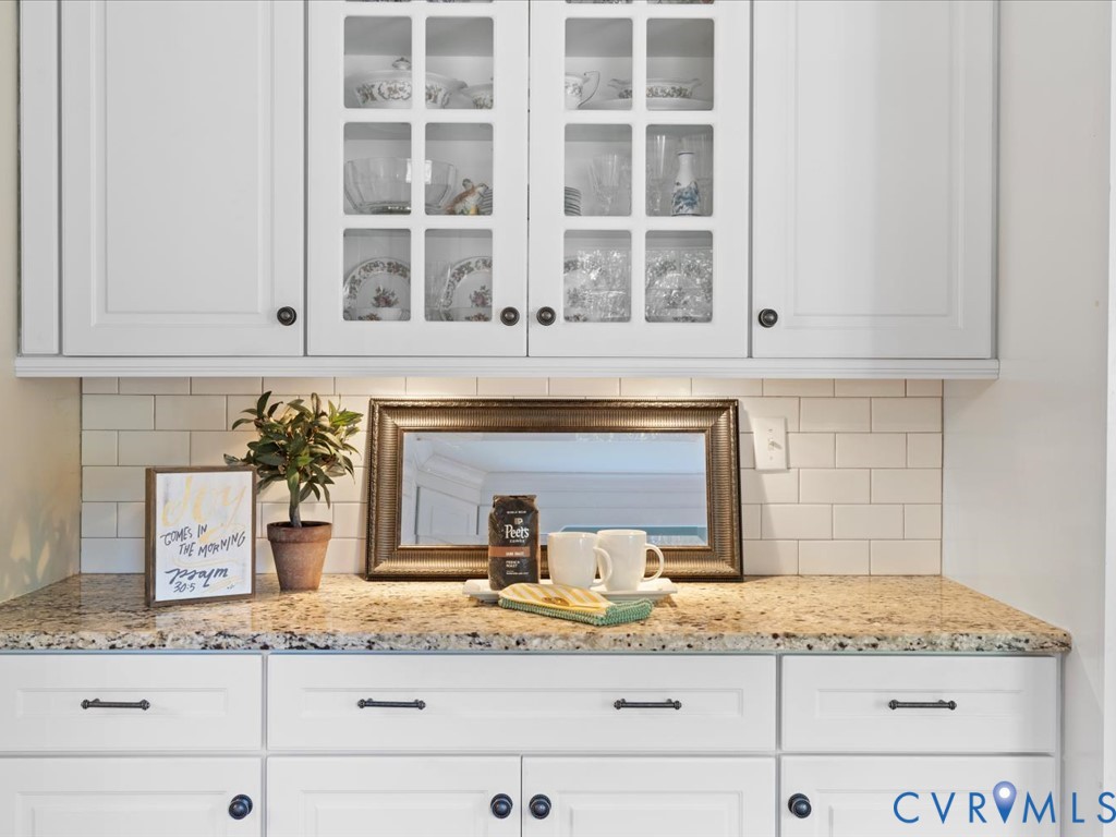5309 Rock Harbour Road Midlothian, VA 23112 - Photo 17 of 47 a kitchen with granite countertop a sink and cabinets