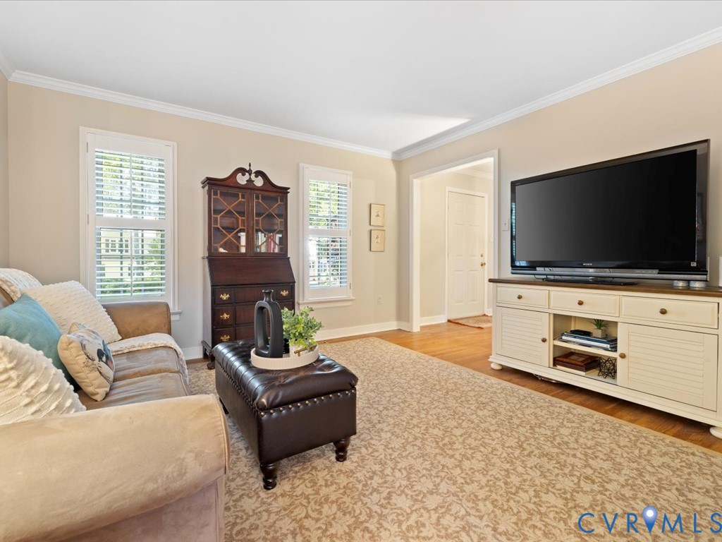 5309 Rock Harbour Road Midlothian, VA 23112 - Photo 19 of 47 a living room with furniture and a flat screen tv