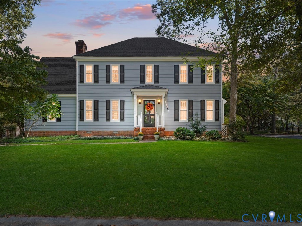 5309 Rock Harbour Road Midlothian, VA 23112 - Photo 2 of 47 a front view of a house with a garden