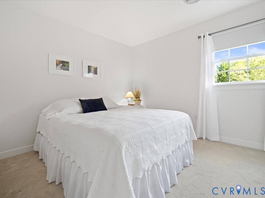5309 Rock Harbour Road Midlothian, VA 23112 - Photo 26 of 47 a bedroom with a bed and a window