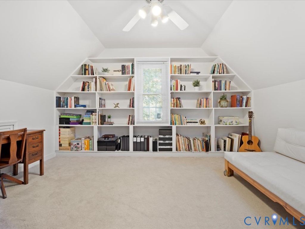 5309 Rock Harbour Road Midlothian, VA 23112 - Photo 28 of 47 a living room with lots of furniture and a book shelf