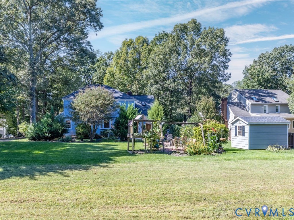 5309 Rock Harbour Road Midlothian, VA 23112 - Photo 33 of 47 a front view of a house with garden