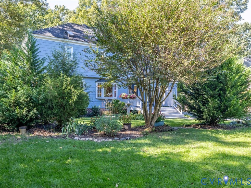 5309 Rock Harbour Road Midlothian, VA 23112 - Photo 34 of 47 a view of a house with backyard and a tree