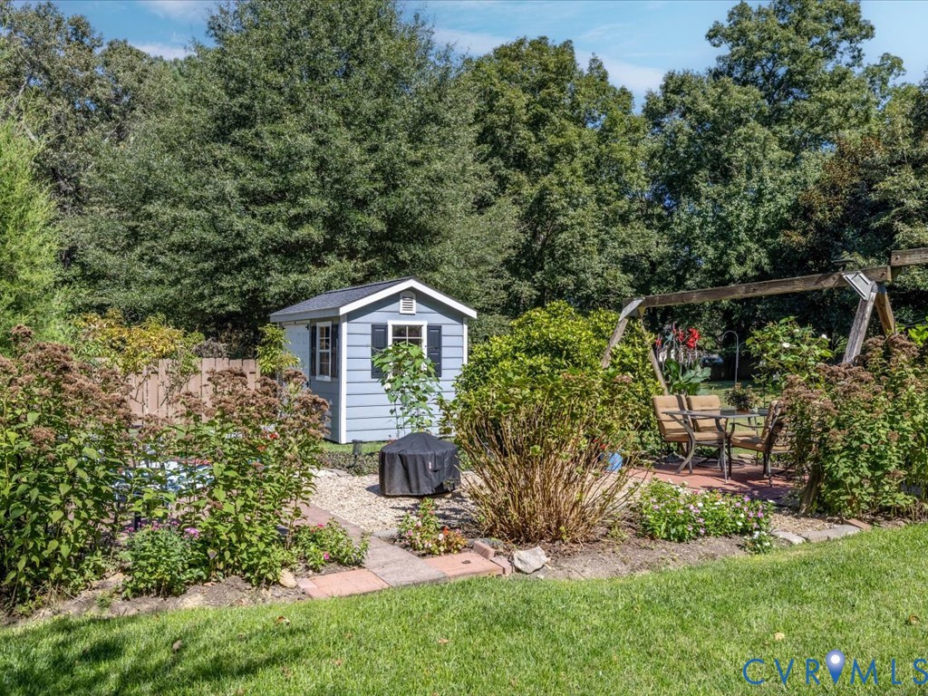 5309 Rock Harbour Road Midlothian, VA 23112 - Photo 35 of 47 a front view of a house with garden