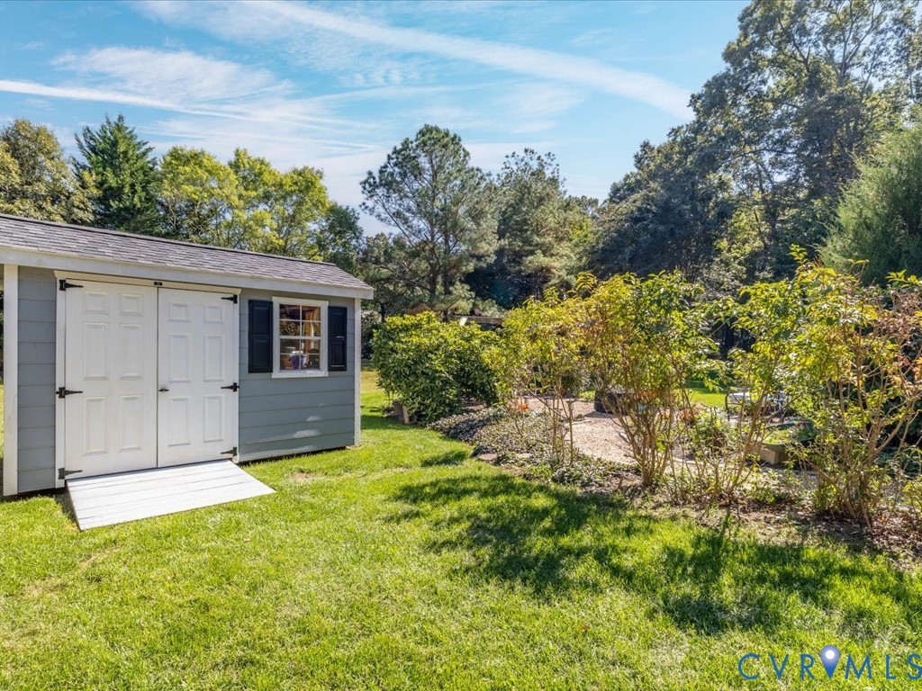 5309 Rock Harbour Road Midlothian, VA 23112 - Photo 36 of 47 a view of a house with a yard