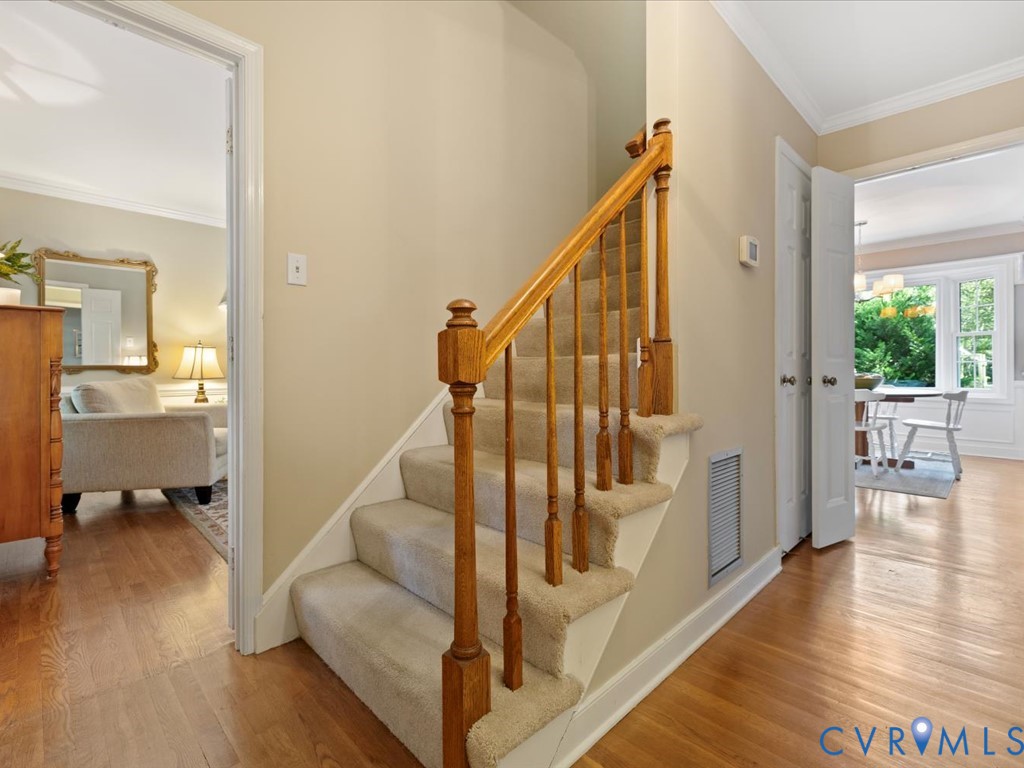 5309 Rock Harbour Road Midlothian, VA 23112 - Photo 5 of 47 a view of entryway and hall with wooden floor