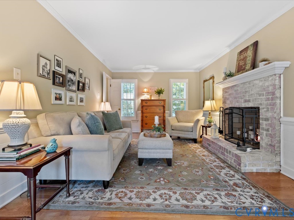 5309 Rock Harbour Road Midlothian, VA 23112 - Photo 8 of 47 a living room with furniture and a fireplace