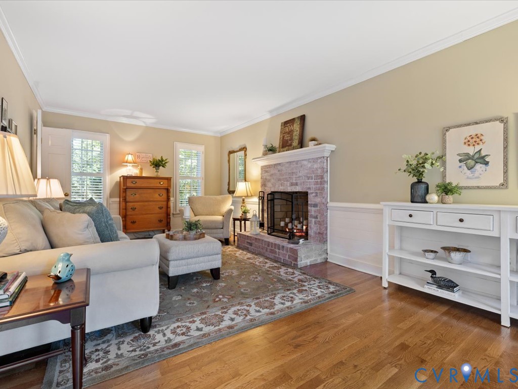 5309 Rock Harbour Road Midlothian, VA 23112 - Photo 10 of 47 a living room with furniture and a fireplace