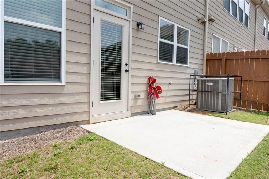 7621 Avalon Boulevard Fairburn, GA 30213 - Photo 25 of 25 a backyard of a house
