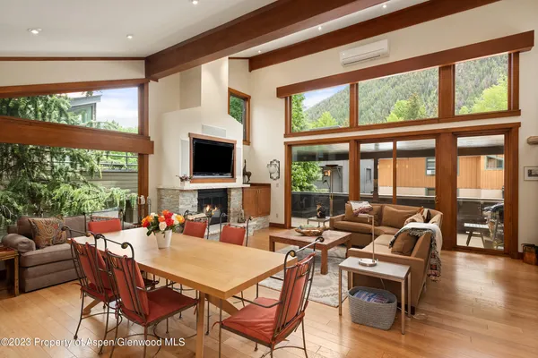 a view of a dining room with furniture window and outside view