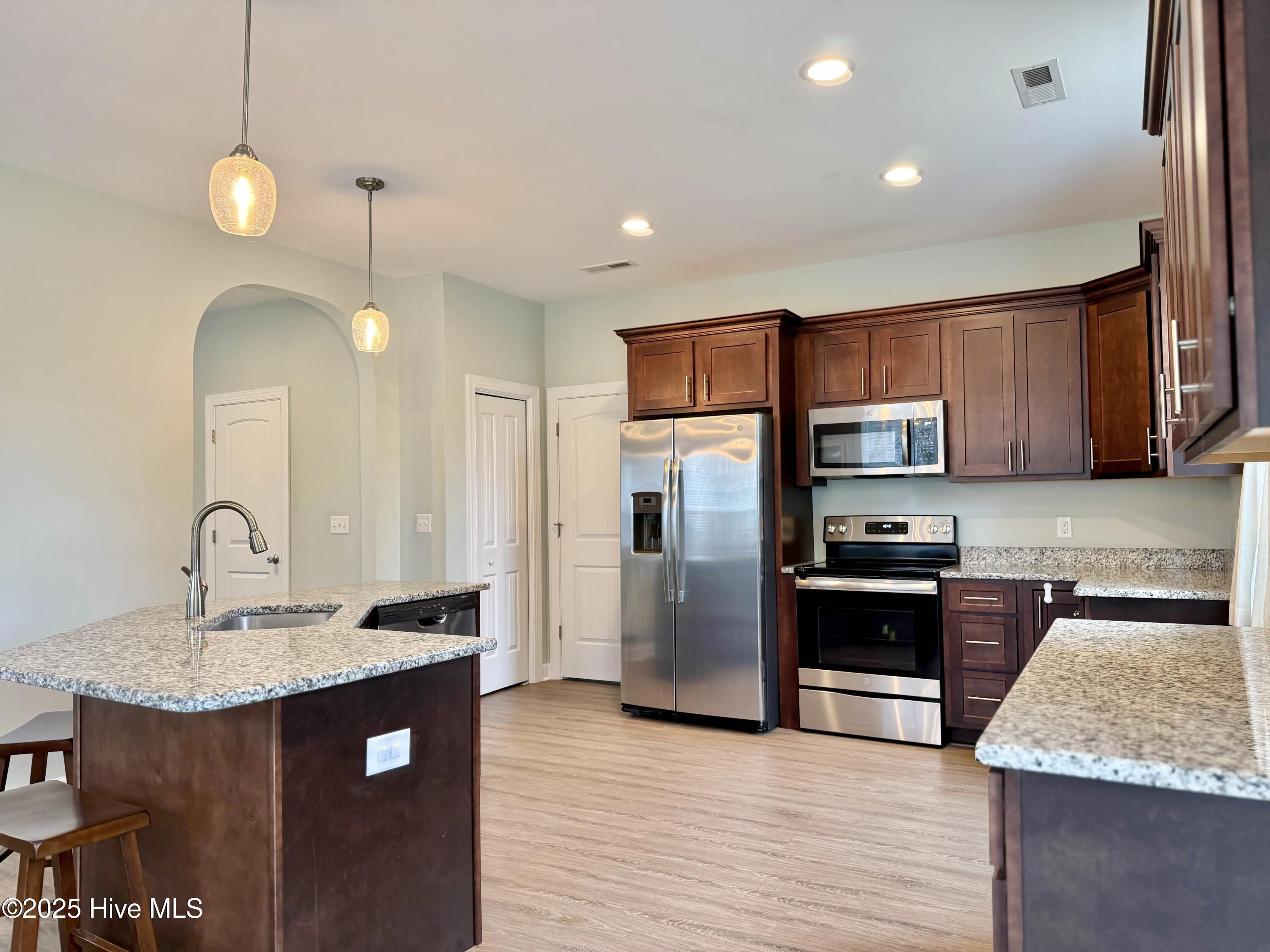 201 Willa's Court Holly Ridge, NC 28445 - Photo 24 of 77 Kitchen to Garage View