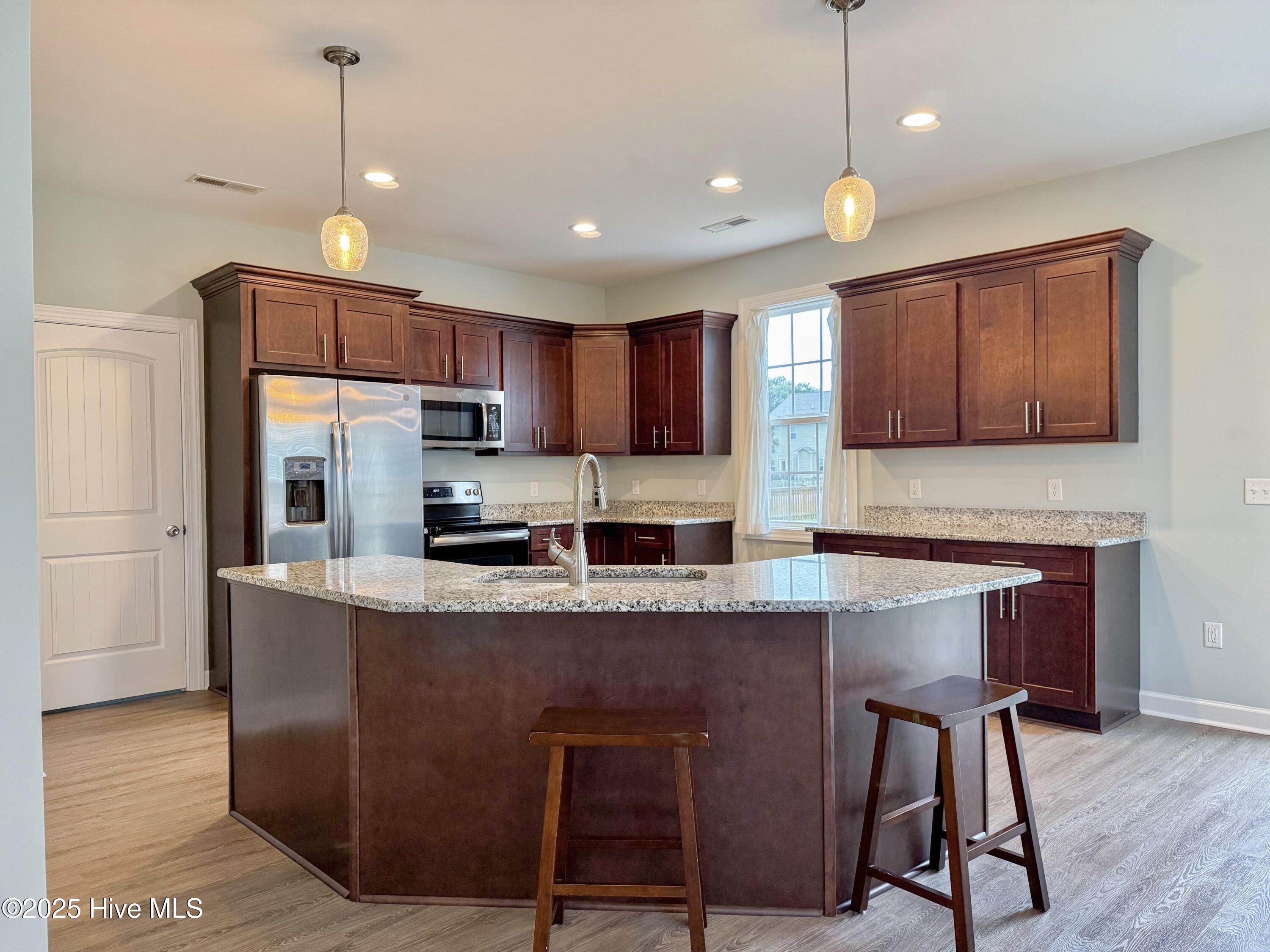 201 Willa's Court Holly Ridge, NC 28445 - Photo 8 of 77 Kitchen Island