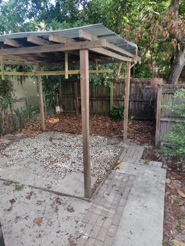 a view of the house with a swimming pool