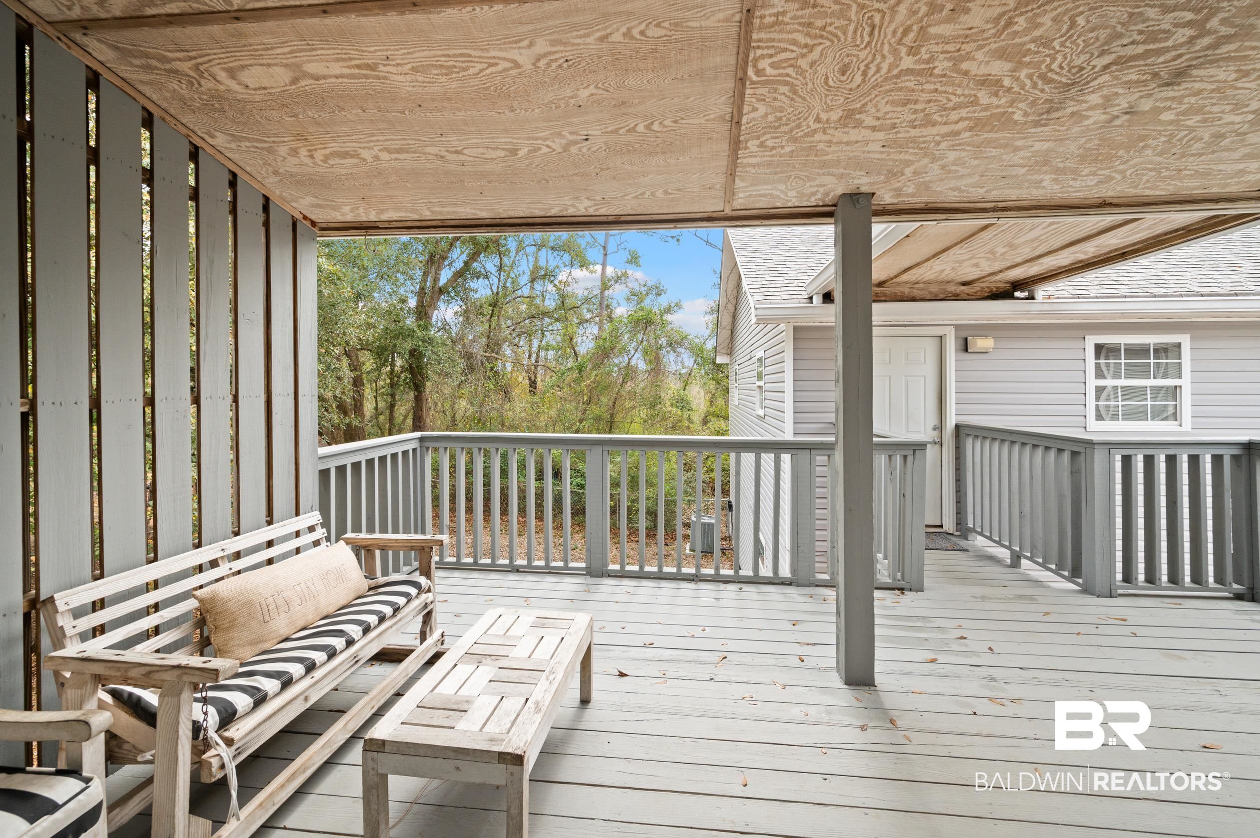 18786 Hillside Drive Foley, AL 36535 - Photo 35 of 49 Covered Wood Deck