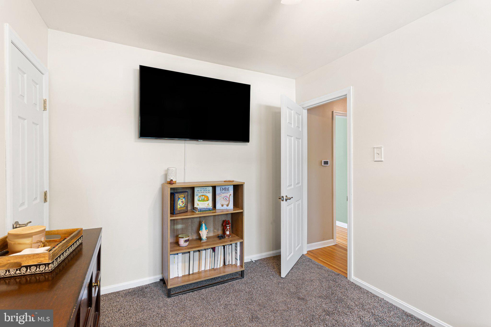 725 West 3rd Avenue Runnemede, NJ 08078 - Photo 18 of 35 a living room with furniture and a flat screen tv