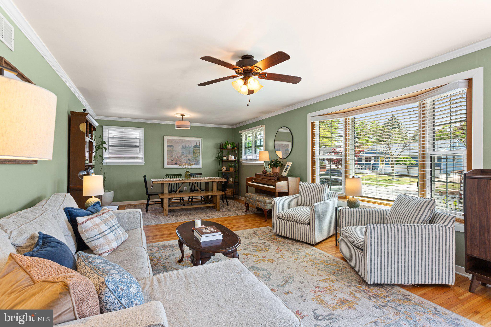 725 West 3rd Avenue Runnemede, NJ 08078 - Photo 2 of 35 a living room with furniture and a large window