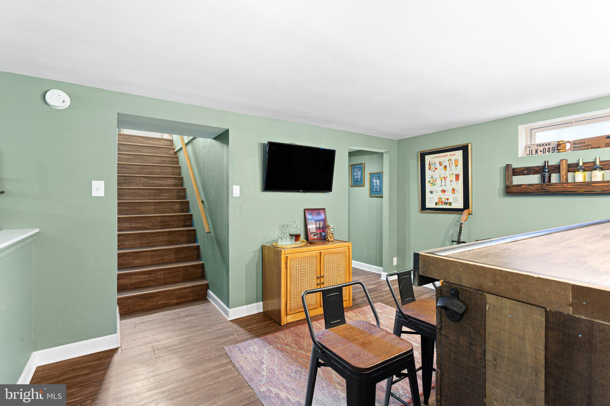 725 West 3rd Avenue Runnemede, NJ 08078 - Photo 22 of 35 a view of a livingroom with furniture and a flat screen tv