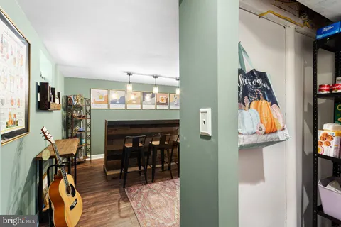 a view of living room with furniture and window