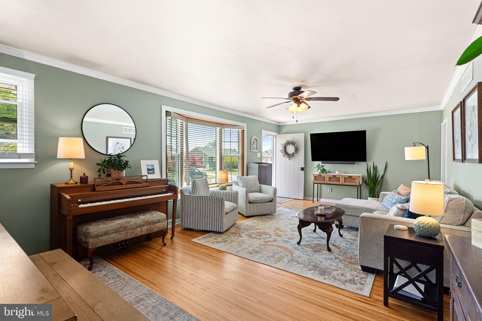 725 West 3rd Avenue Runnemede, NJ 08078 - Photo 5 of 35 a living room with furniture and a flat screen tv