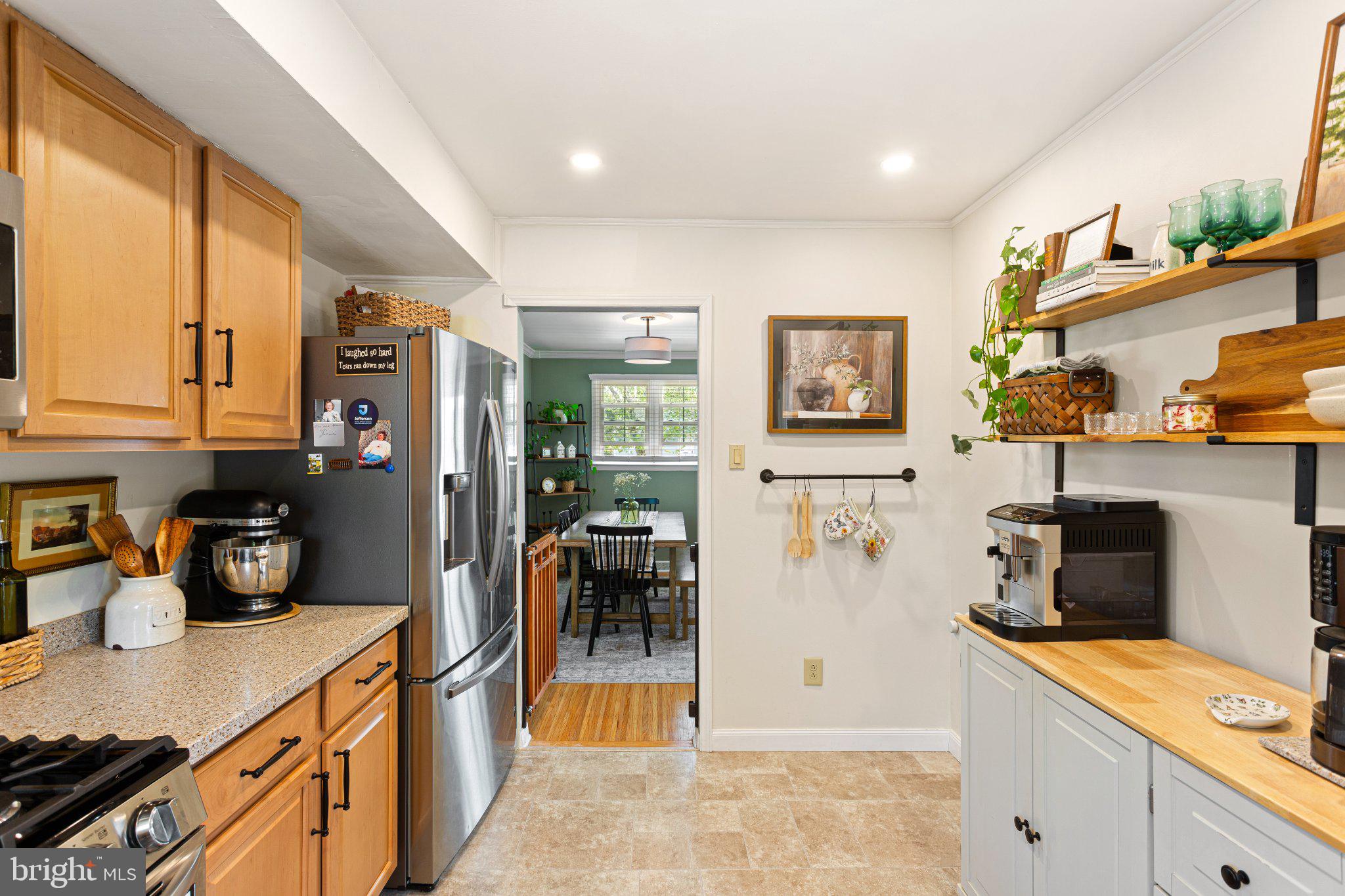 725 West 3rd Avenue Runnemede, NJ 08078 - Photo 7 of 35 a kitchen that has a lot of cabinets a sink and a stove in it